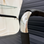 Load image into Gallery viewer, Chrome Armrest Detail on Black Upholstered Office Desk Chair
