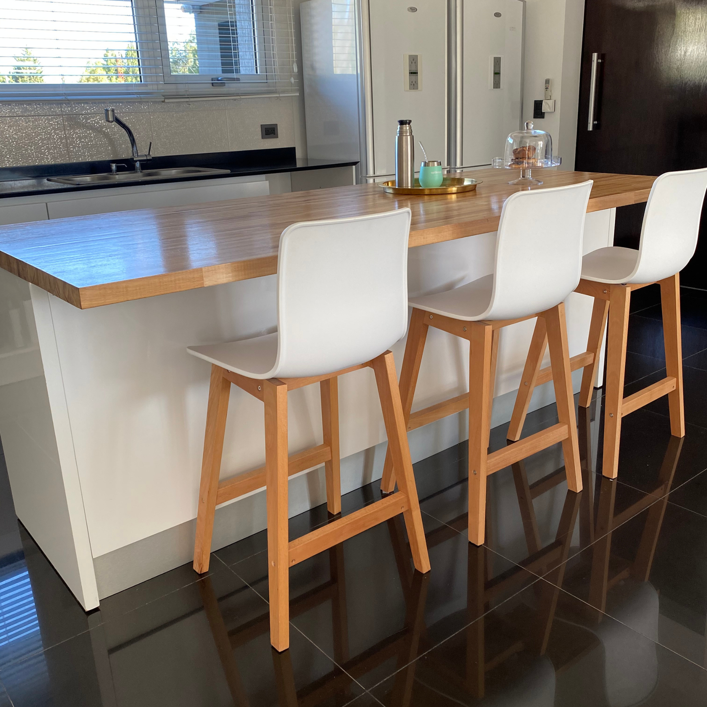 Set of 5 Modern Dining Chairs Around a Contemporary Dining Table