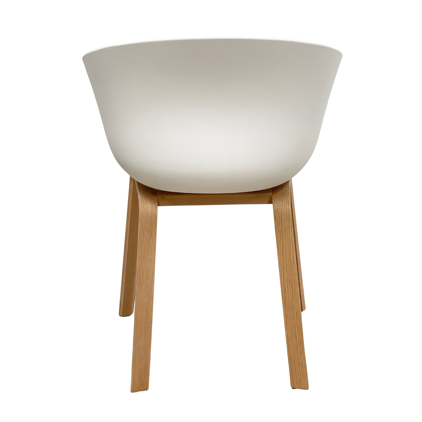 Side profile of grey upholstered Scandinavian dining chair