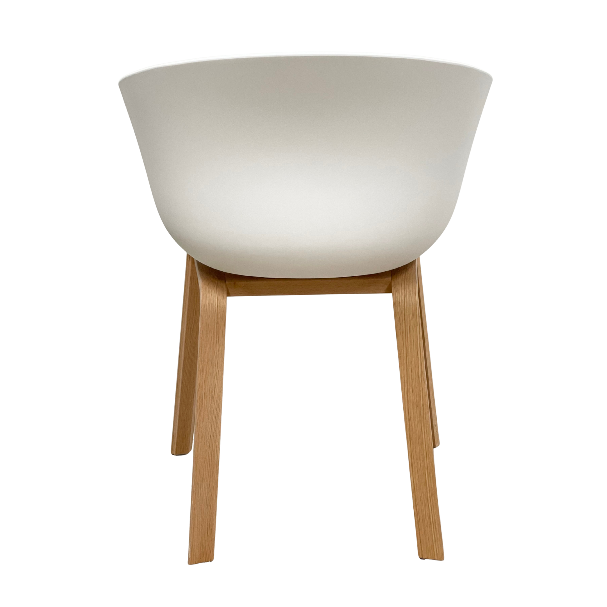 Side profile of grey upholstered Scandinavian dining chair