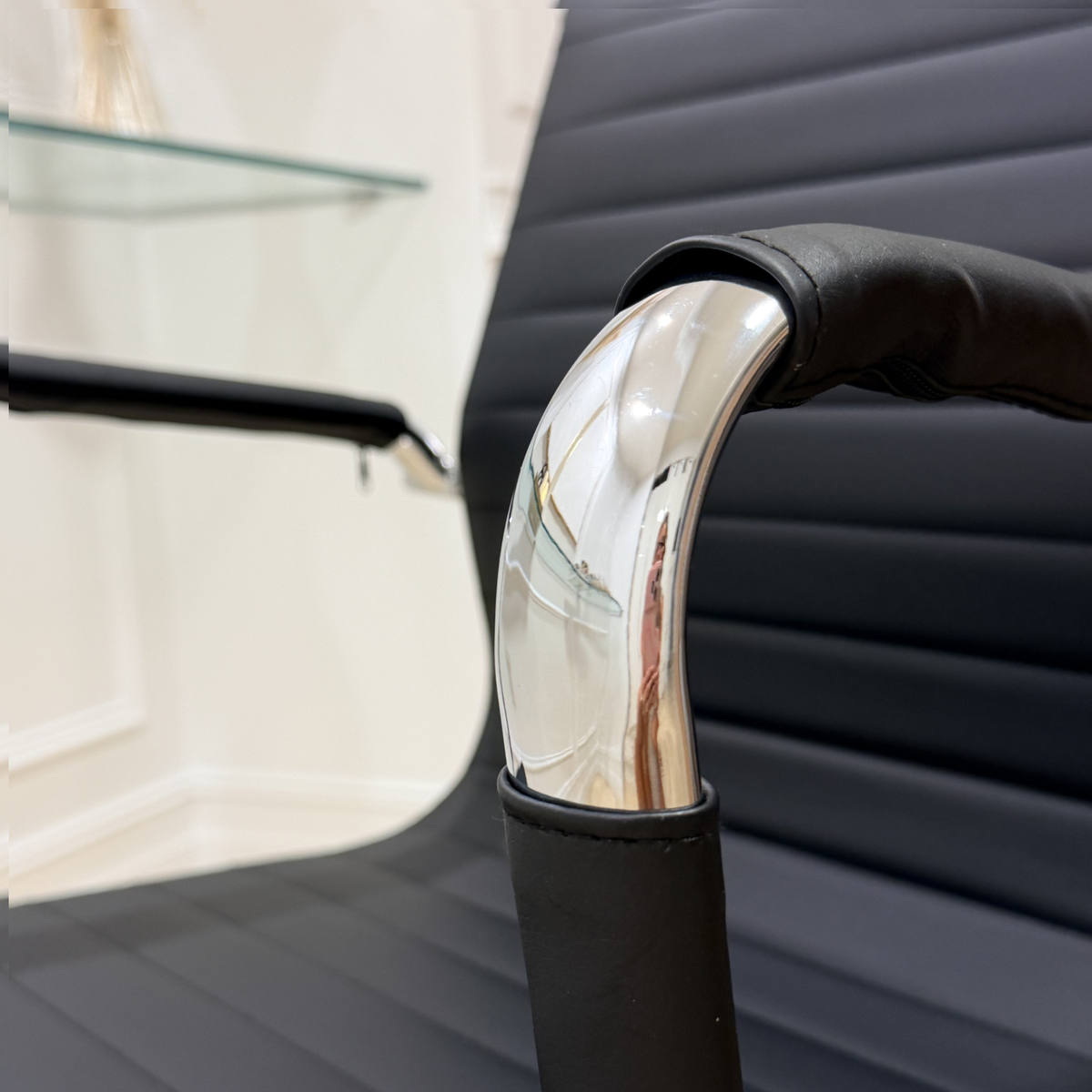 Close up of smooth-rolling dual-wheel caster attached to chrome star base