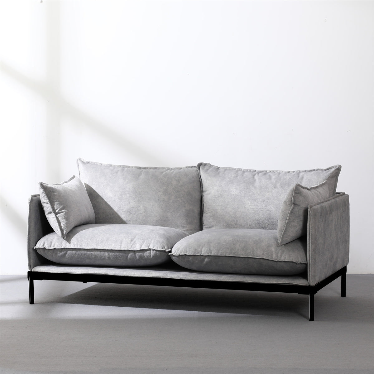 Modern grey fabric 2-seater office waiting room sofa with sleek black metal frame and plush cushions